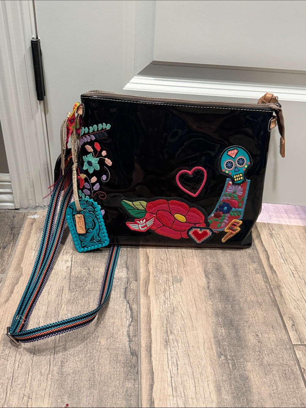 Consuela Black Embroidered Floral Patch Crossbody Bag